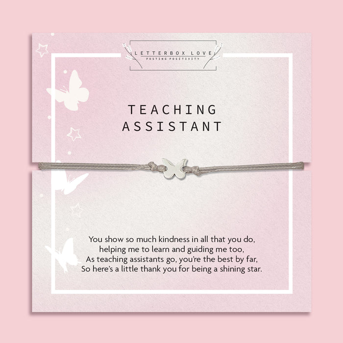 Pale pink "teaching assistant" thank you care with a subtle grey friendship bracelet with a cute butterfly charm. A beautiful gift to say thank you to a teacher under £10