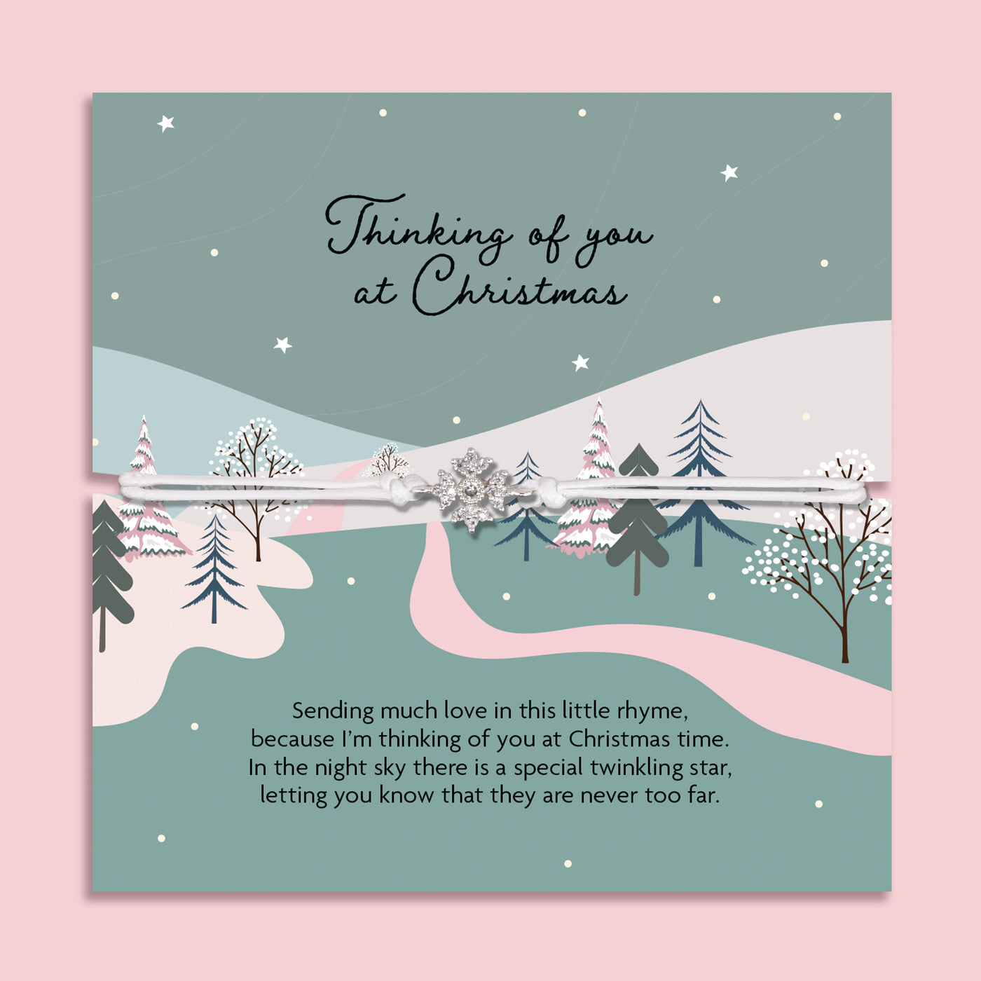 Thinking of You at Christmas bracelet featuring a sparkling cubic zirconia snowflake charm on an adjustable cord, presented on a festive winter card with snowy trees, stars, and heartfelt poem. Includes a soft white pouch for gifting and safekeeping. A sentimental Christmas jewellery gift, perfect for friends, family, or loved ones. Ideal as a stocking filler, memorial keepsake, or thoughtful way to show love and remembrance during the holiday season.