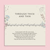 Silver leaf vine friendship bracelet displayed on a neutral floral illustrated card reading “Through Thick and Thin” with a sentimental friendship poem underneath.