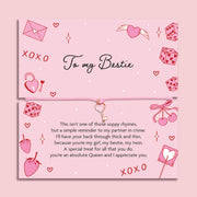 Poem card with decorative elements and text about friendship on a pink background. The Bracelet is a pink key friendship bracelet