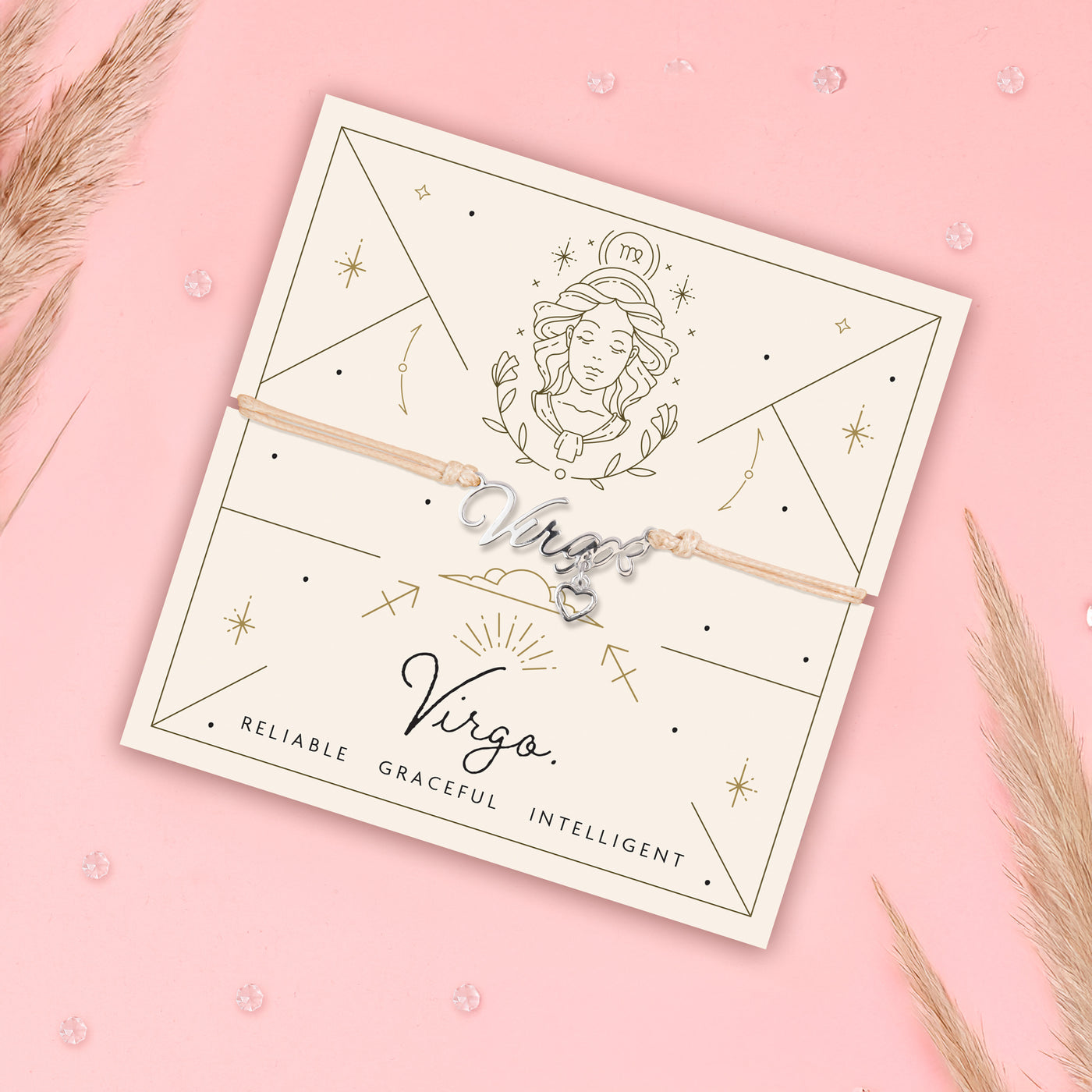 Bracelet with Virgo zodiac design on a pink background with campus grass decor. Thoughtful star sign bracelet for a best friend