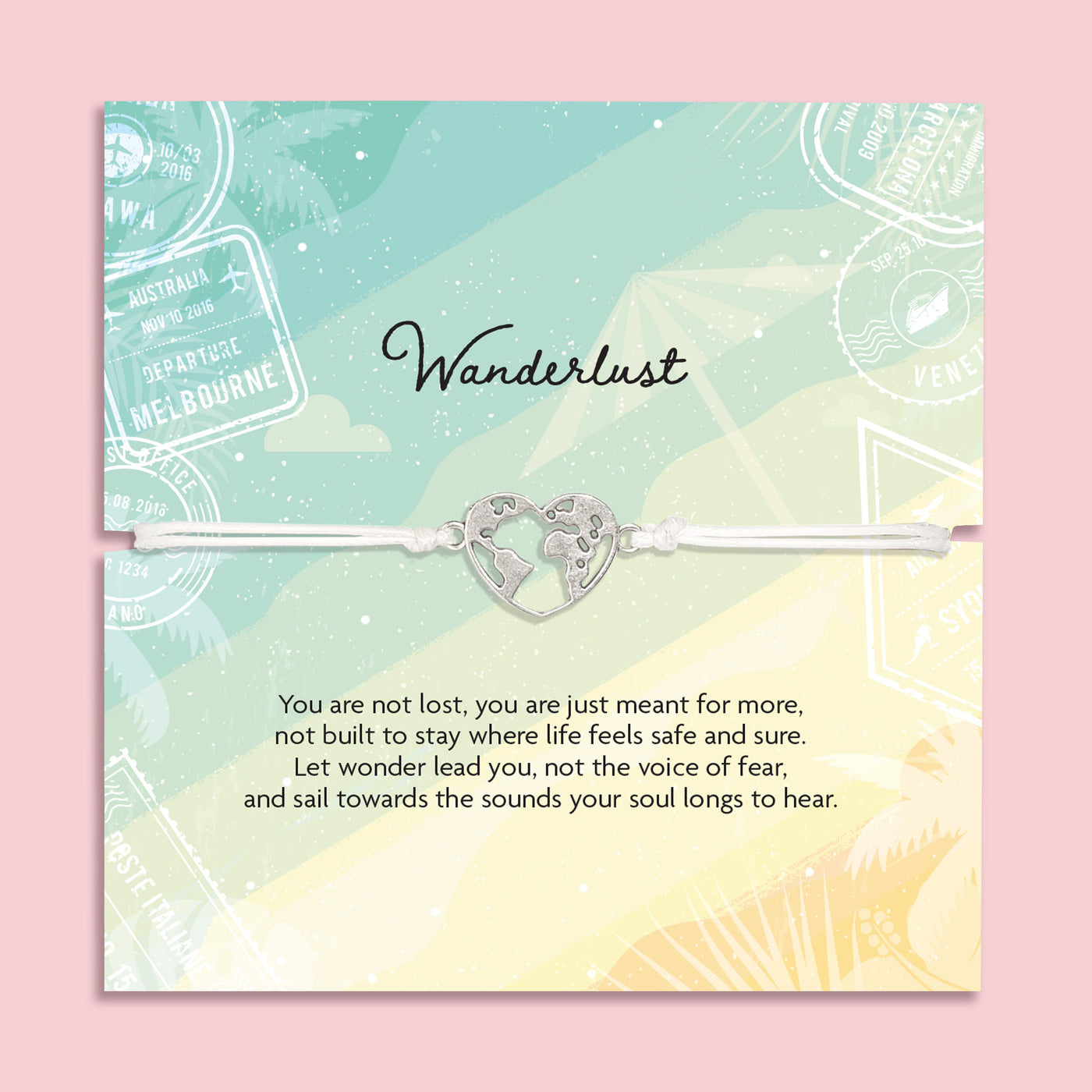 Adjustable white cord Wanderlust bracelet with a silver world map heart charm displayed on a travel-themed poem card and presented in a luxury white butterfly envelope.
