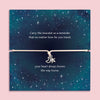 Moon and star bracelet featuring a silver-tone crescent moon and star charm on an adjustable cord, presented on a galaxy night sky card with the message “no matter how far you travel, your heart always knows the way home.” This celestial bracelet makes a meaningful travel gift, long distance friendship bracelet, or wanderlust jewellery keepsake. It’s a thoughtful gift for her, perfect for birthdays, farewells, graduations, or symbolic everyday wear.