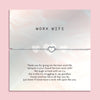 A grey poem card as a leaving gift for a colleague. The silver-plated heart bracelet in dainty around the poem card making a beautiful leaving gift for her