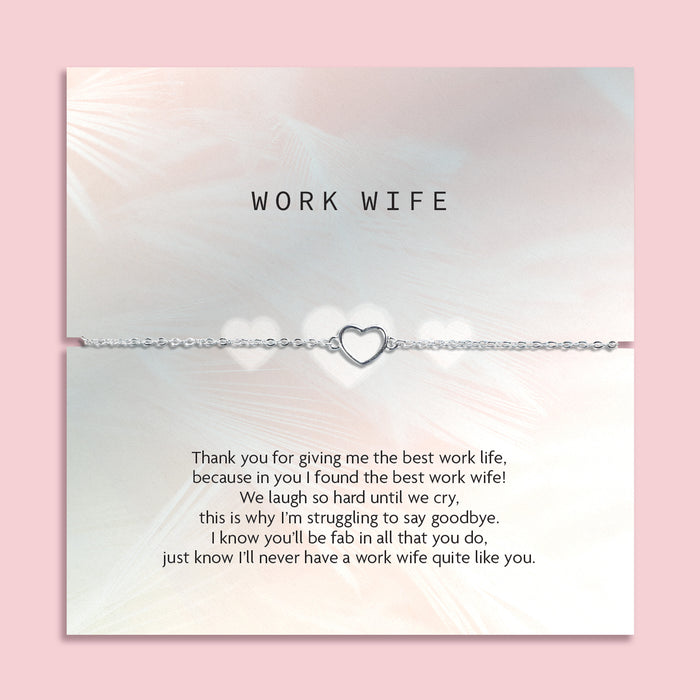 A grey poem card as a leaving gift for a colleague. The silver-plated heart bracelet in dainty around the poem card making a beautiful leaving gift for her