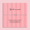 You’ll be missed heart bracelet on adjustable chain displayed on pink farewell card with message, leaving gift for colleague or friend