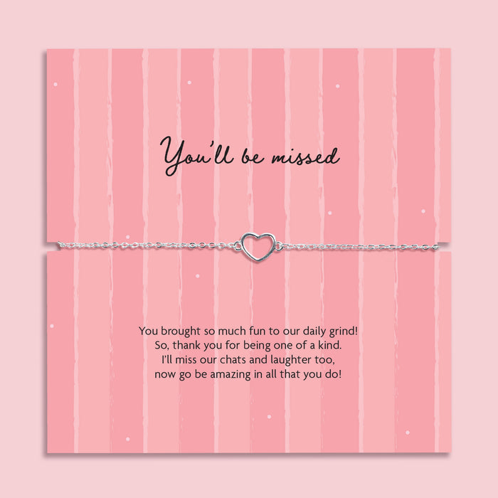 You’ll be missed heart bracelet on adjustable chain displayed on pink farewell card with message, leaving gift for colleague or friend