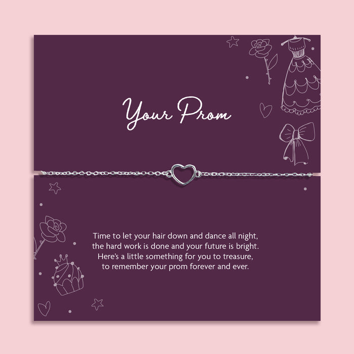 Prom bracelet with open heart charm on adjustable chain displayed on purple prom message card, keepsake gift for prom night