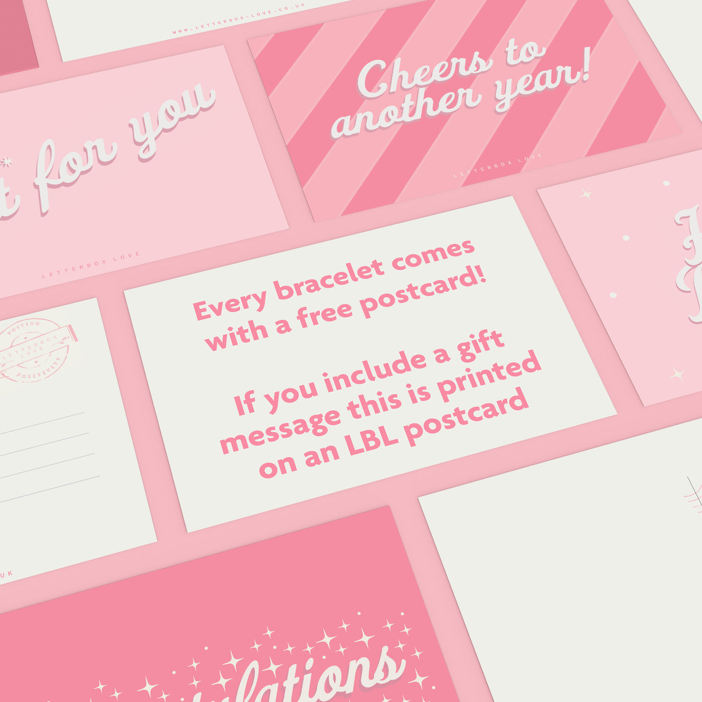 a bunch of pink and white greeting cards