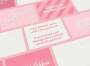 a bunch of pink and white greeting cards