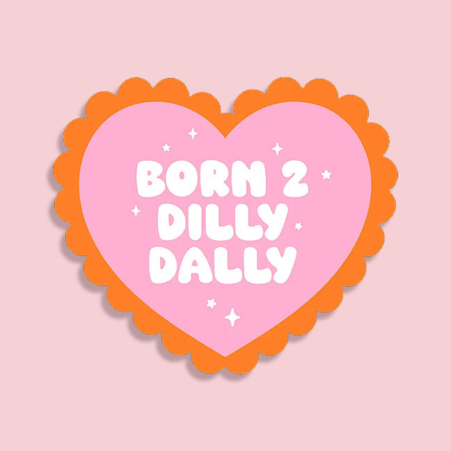 Heart-shaped pink sign with 'Born 2 Dilly Dally' text on a pink background. Cute aesthetic sticker