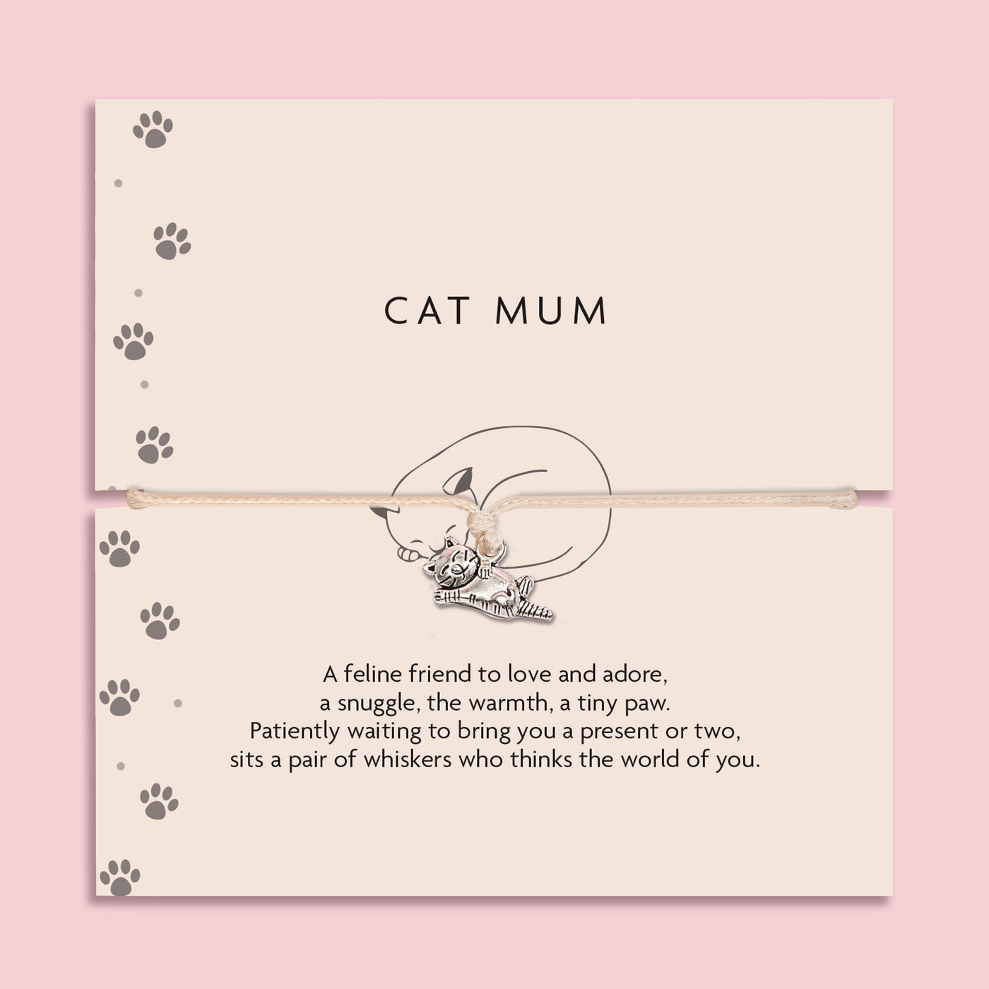 Cat-themed bracelet on a card with paw prints and text on a pink background