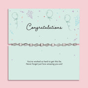 Silver plated congratulations bracelet with sparkling cubic zirconia detailing displayed on a mint-green sentiment card reading “Congratulations” and “You’ve worked so hard to get this far”, a graduation, exam results and achievement gift for her.