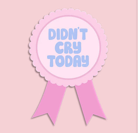 Pink badge with 'Didn't Cry Today' badge sticker on a light pink background. Ideal for journals or water bottles.