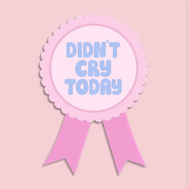 Pink badge with 'Didn't Cry Today' badge sticker on a light pink background. Ideal for journals or water bottles.