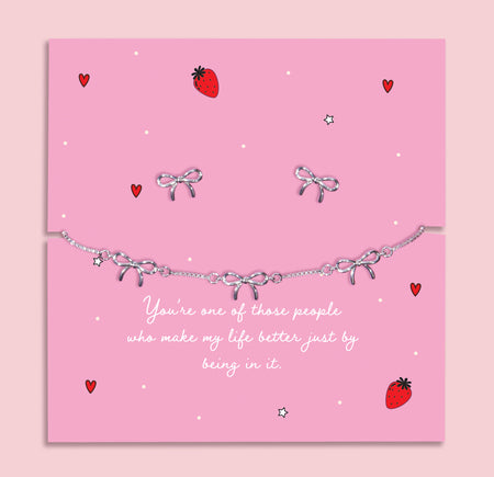 Silver-plated bow bracelet and earrings set, presented in a gift box with a heartfelt sentiment card that celebrates friendship and appreciation.