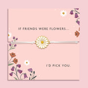 White adjustable friendship bracelet with a white enamel daisy flower charm displayed on a pink floral sentiment card reading "If Friends Were Flowers... I'd Pick You", presented as a thoughtful friendship gift.