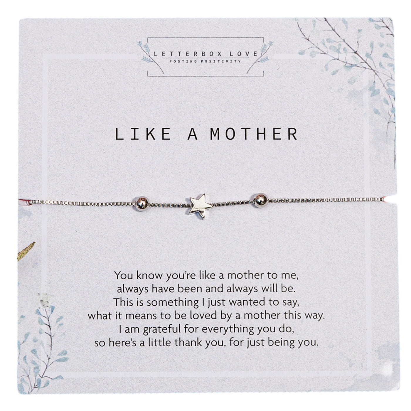 A silver bracelet with a central star charm and two small spherical beads presented on a card with the title 'LIKE A MOTHER' in bold letters. Below the bracelet, a heartfelt poem expresses gratitude and love to a motherly figure. The card's background is white with delicate, grey botanical illustrations,