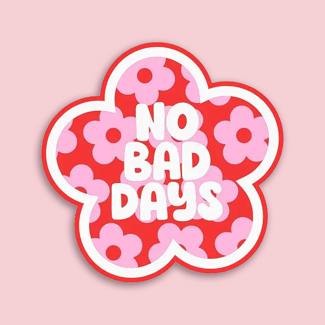Decorative sticker with 'No Bad Days' text and pink flowers on a red background