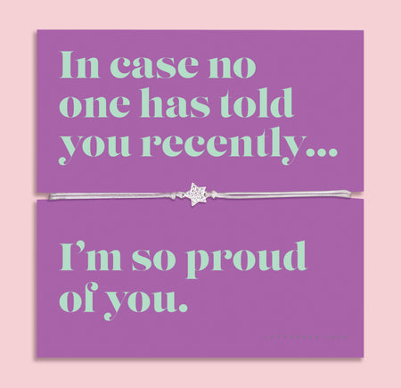Friendship bracelet with a silver star charm on an adjustable cord, displayed on a purple card reading “In case no one has told you recently… I’m so proud of you” — an encouraging bracelet for a friend and meaningful friendship gift by Letterbox Love.