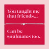 Friendship bracelet with a silver heart charm on an adjustable cord, displayed on a red card reading “You taught me that friends can be soulmates too” — a meaningful bracelet for a friend and thoughtful friendship gift by Letterbox Love.