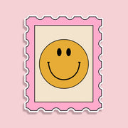 Smiley face design with a pink border on a pink background