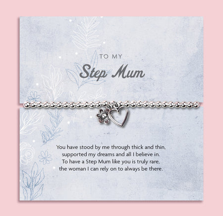 Silver beaded bracelet with a flower and heart charm, presented on a blue floral card with a heartfelt sentiment for a step mum.