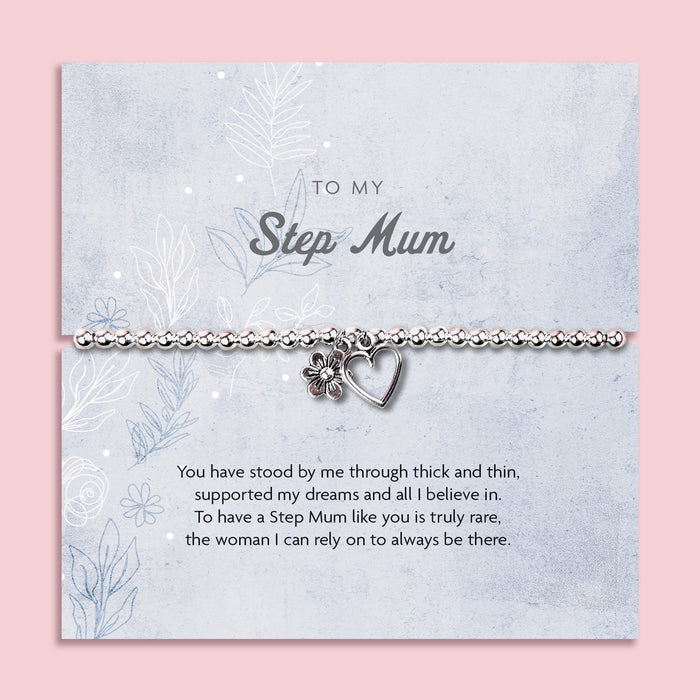 Silver beaded bracelet with a flower and heart charm, presented on a blue floral card with a heartfelt sentiment for a step mum.