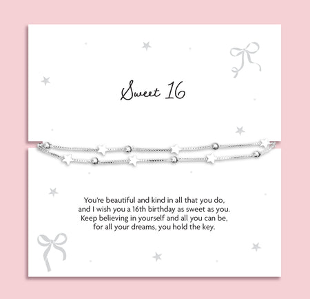 Silver plated double-layer bracelet with star charms and silver bead detailing displayed on a Sweet 16 sentiment card with birthday poem, meaningful 16th birthday gift and keepsake jewellery for a teenage girl.