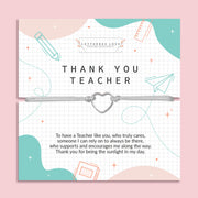 Appreciative 'Thank You Teacher' card on a soft pink background, adorned with geometric and school-related illustrations. The card features heartfelt gratitude text and is accompanied by a delicate bracelet with a heart charm.