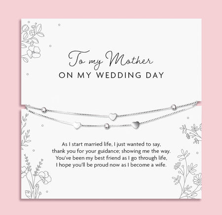 925 sterling silver Mother of the Bride bracelet displayed on a poem card reading “As I start married life…” shown in a white jewellery box with delicate heart and bead details.